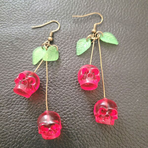 Skull shaped cherry rockabilly goth earrings